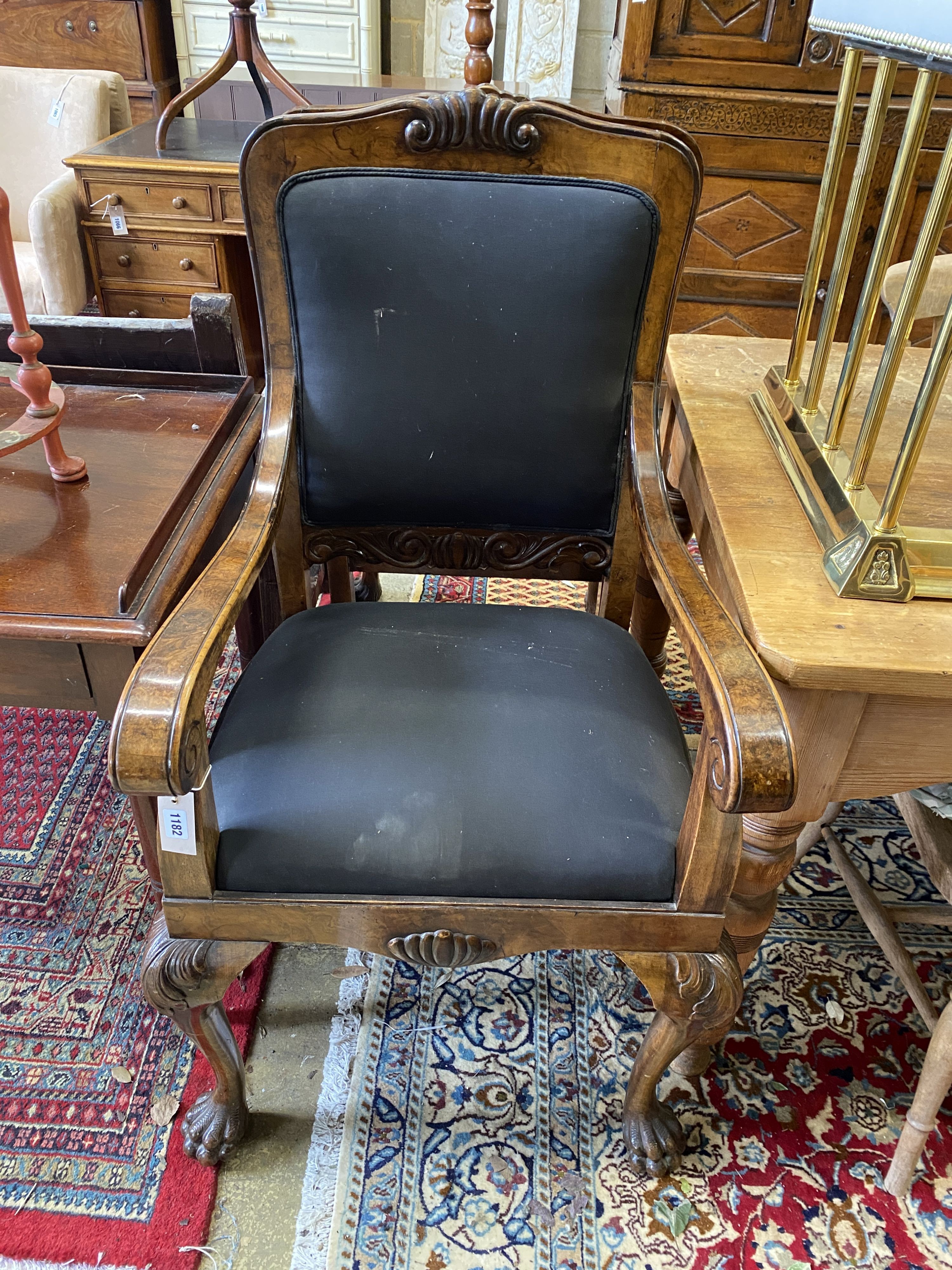 A pair of George II style burr walnut elbow chairs, width 58cm, depth 60cm, height 110cm